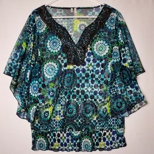 Like NEW! Very flattering V-Neck Embellished Top